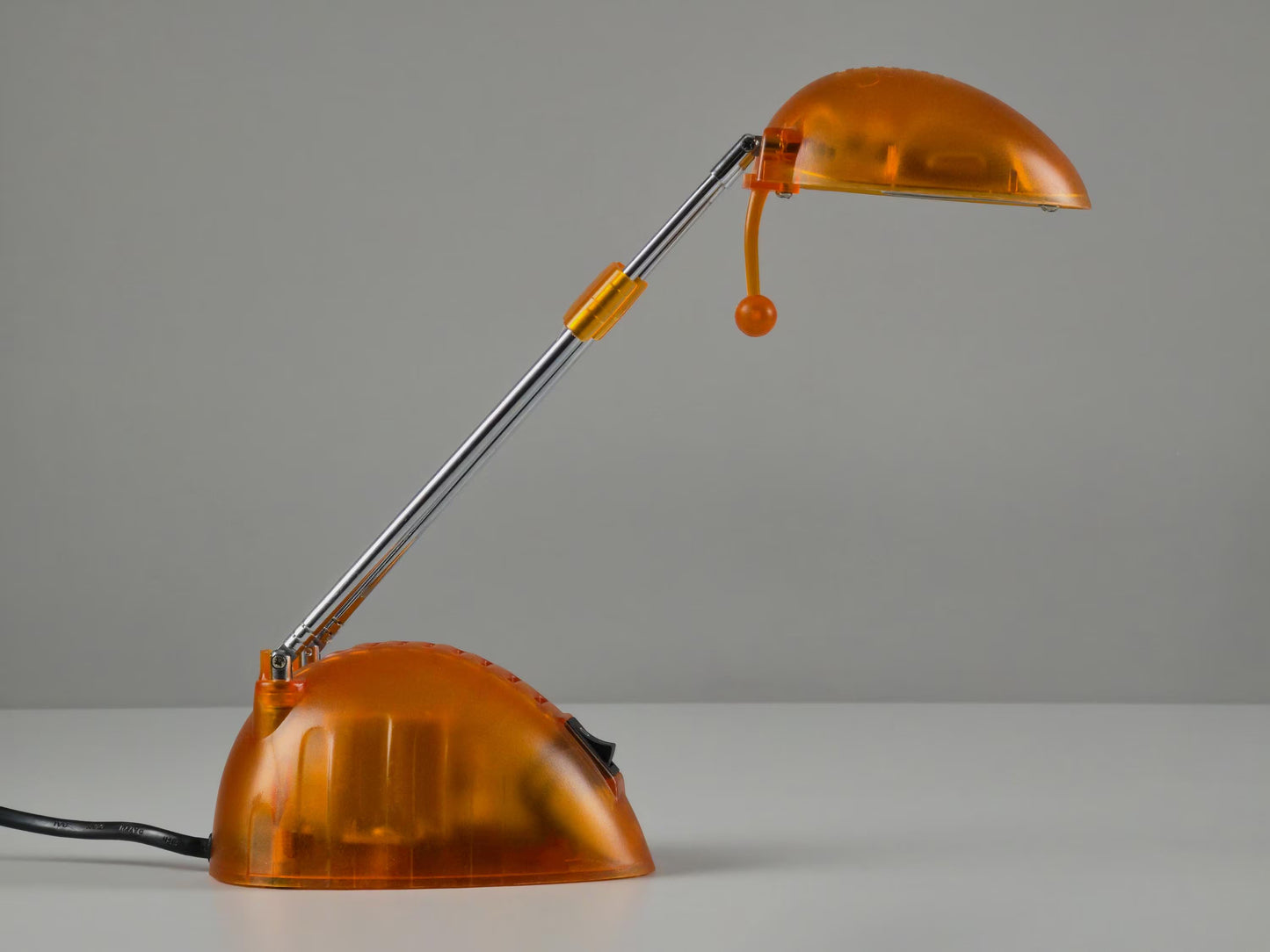 Vintage 1990s Orange Translucent Plastic Adjustable Telescopic Antenna Desk Lamp.
